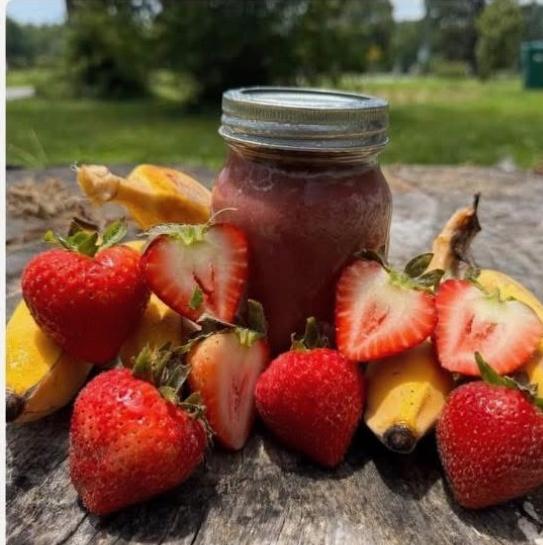 Strawberry banana sea moss juice with fresh strawberries